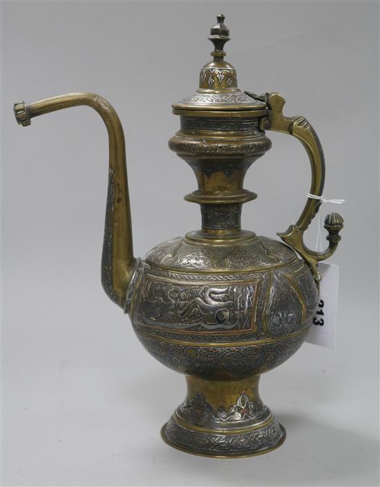 A 19th century Islamic mixed metal and bronze coffee pot